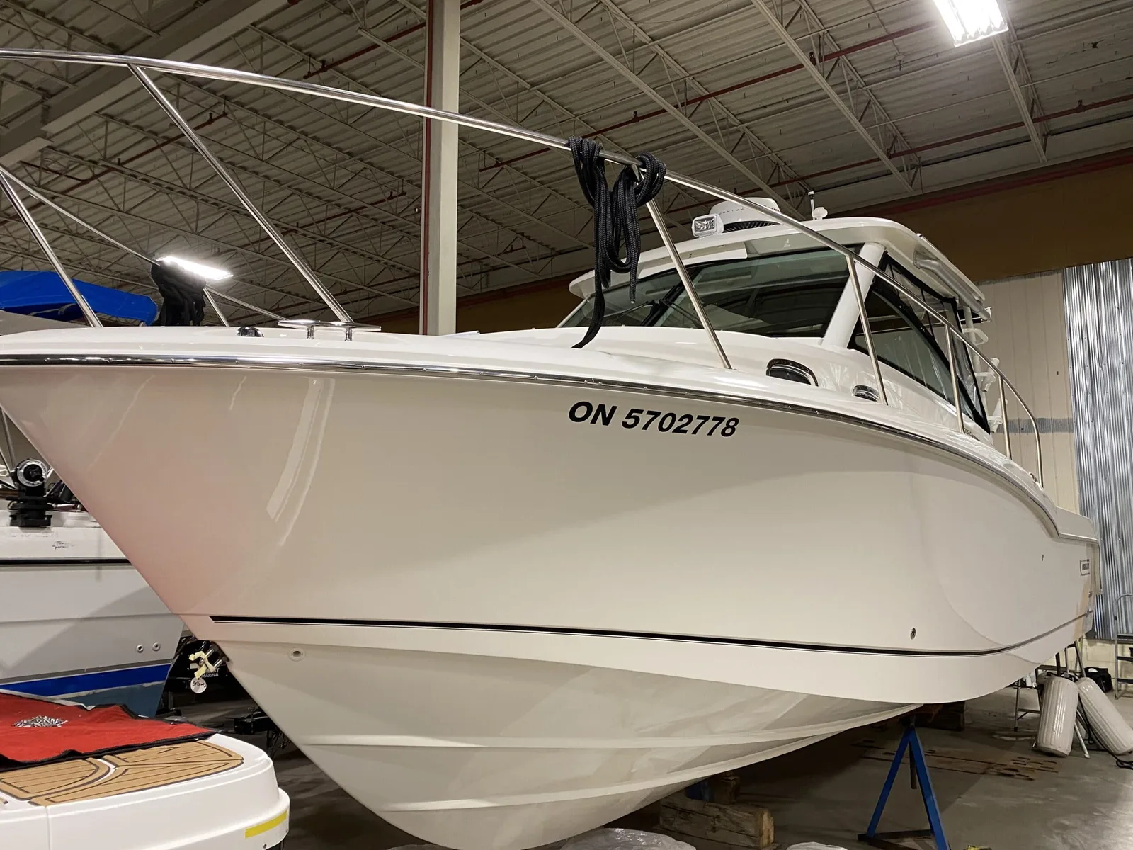 315 Boston Whaler Conquest after gelcoat correction and a ceramic coating by Precision Ceramics in Owen Sound